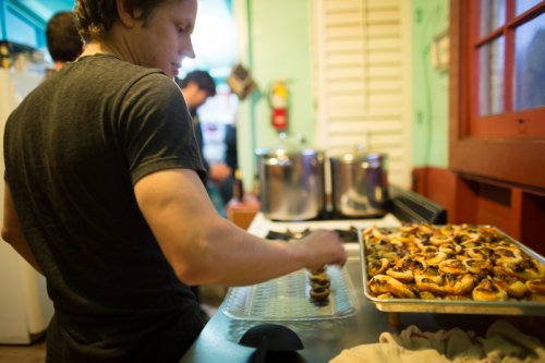 plating the BBC Ruffs - bacon, brussels sprouts and cheddar, on a bed of freshly made rough puff pastry
