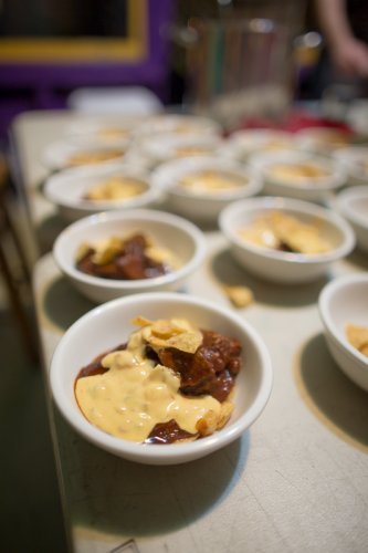 smoked frito pie - "smoked brisket, chili with tomatoes concasse, fire-roasted anaheim chiles and other vegetables and spices, Fritos, Texas-style queso"